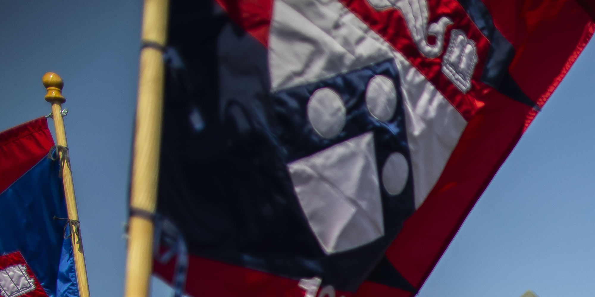 Penn flags fying during the annual comemencement ceremony
