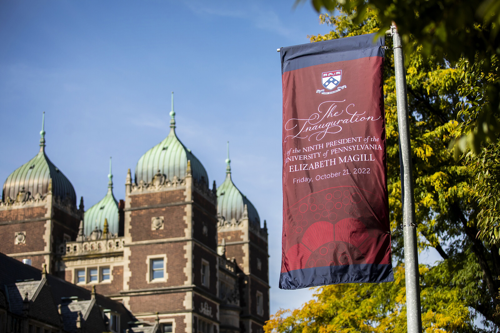 Commemortive Inauguration banners hanging near the main entrance to Penn's historic Quadrangle