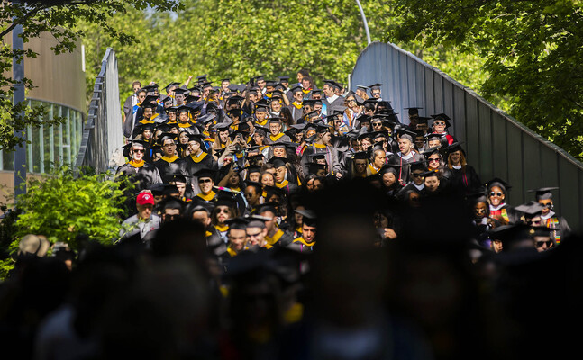 Commencement procession crossing the 38th St bridge